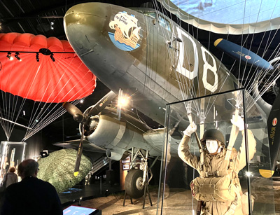Parachute and plane in museum