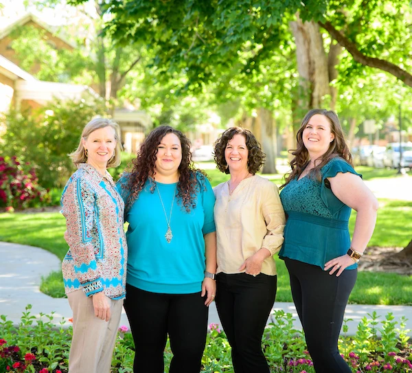 osher staff in the park, smiling