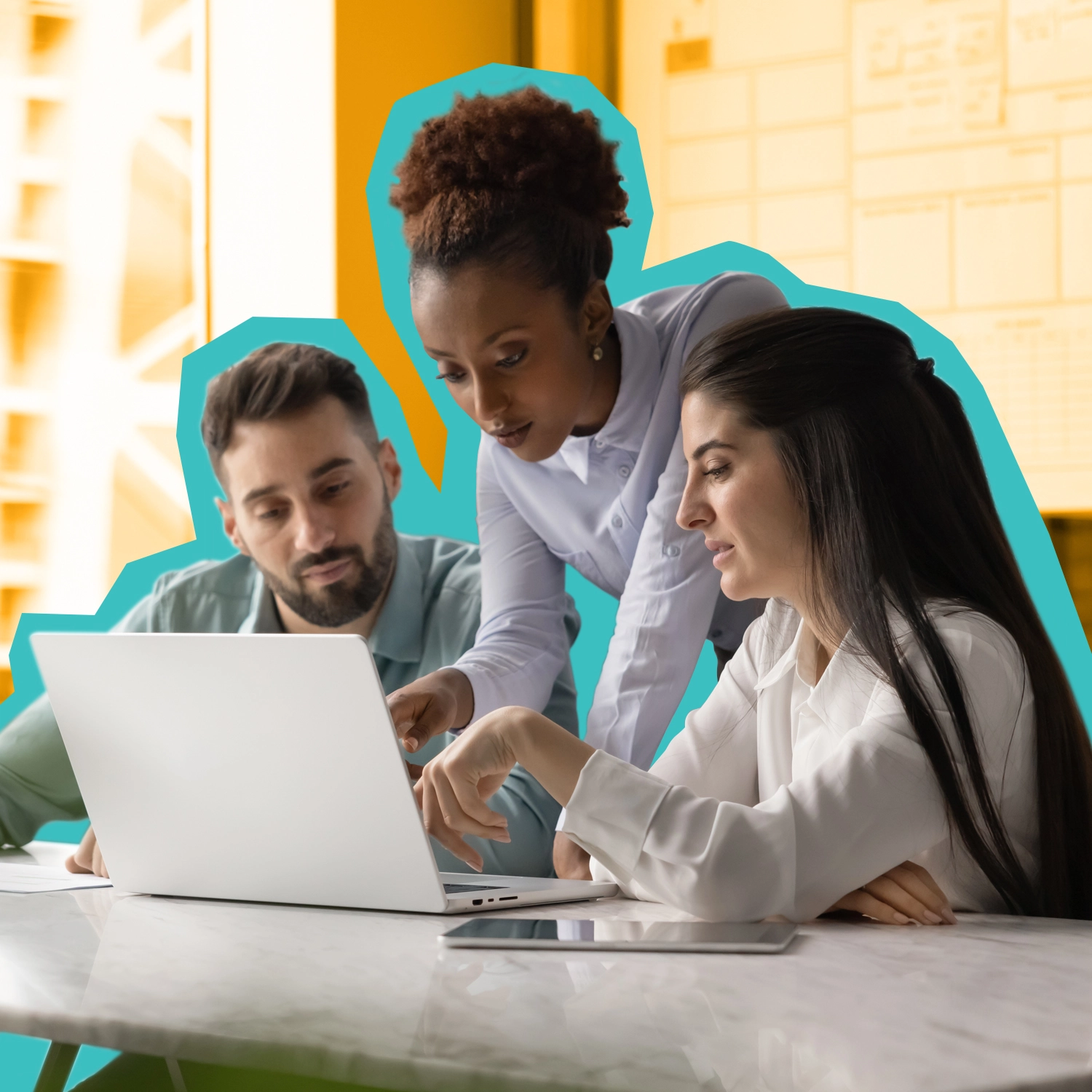 A man and a woman consult another woman at their computer.