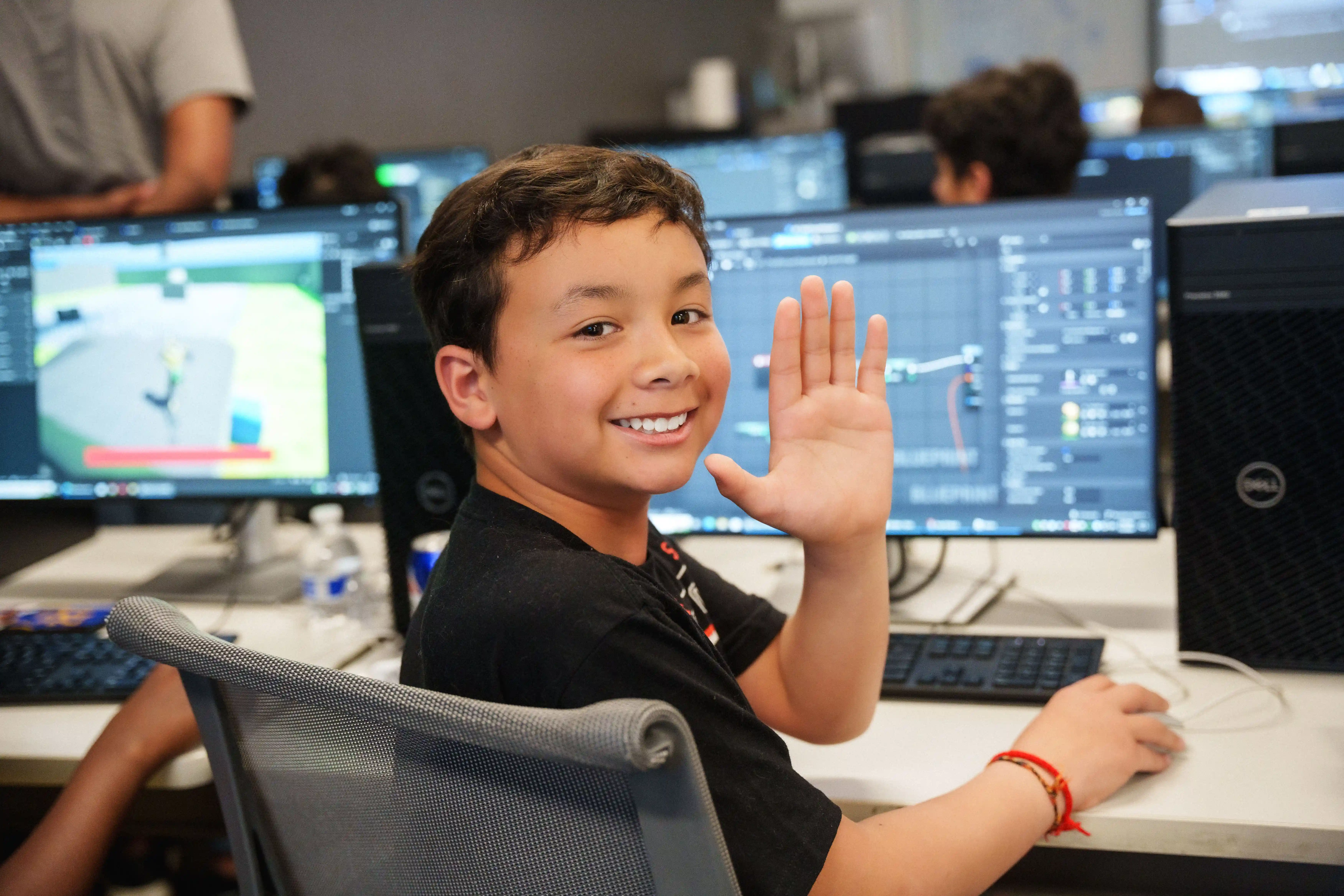 A camper enjoying his video game modeling class